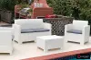 Белый комплект пластиковой мебели (столик, диван и 2 кресла) Rattan Nеbraska на 2 персоны с зелеными подушками