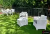 Белый комплект пластиковой мебели (столик, диван и 2 кресла) Rattan Nеbraska на 2 персоны с зелеными подушками
